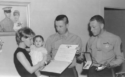 Receiving Dad's medals.